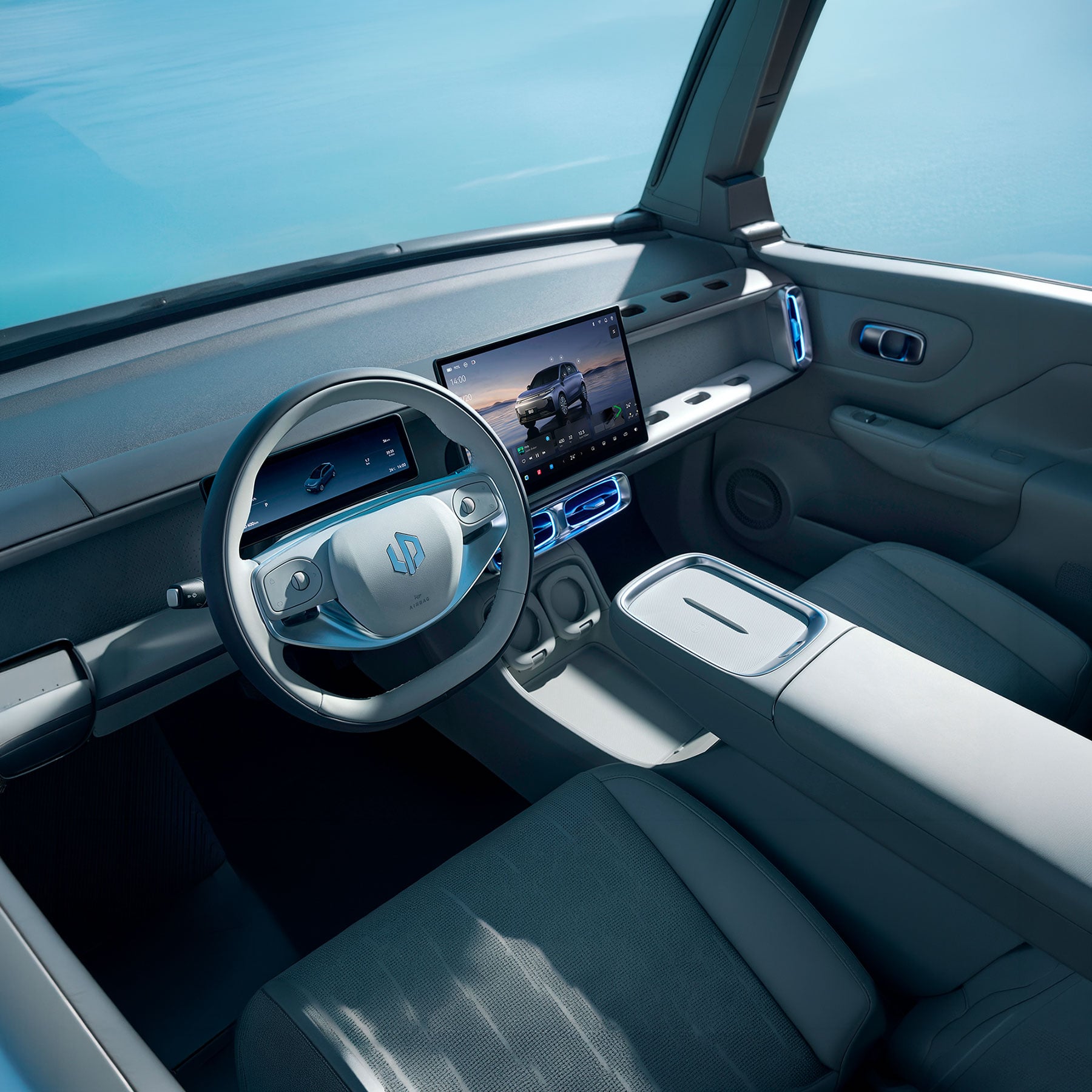Interior de un vehículo Leapmotor con pantalla central y volante multifunción